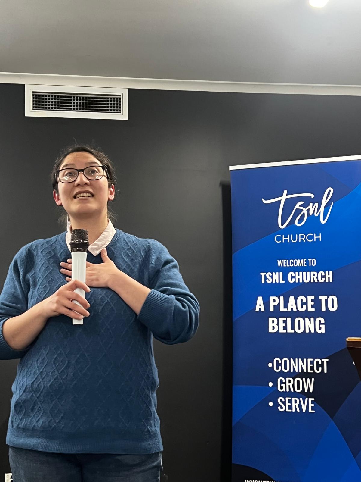 Sara sharing at the pulpit at a Saturday service at TSNL Church Melbourne
